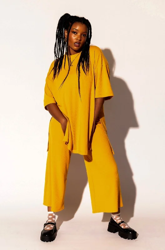 Lex Ribbed Playsuit in Golden Yellow Slim fit jumpsuit, Trendy, Sleek, Comfortable